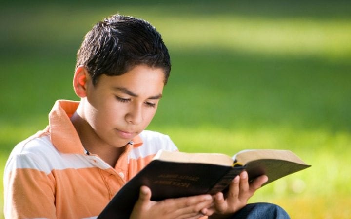 Image of a young child studying